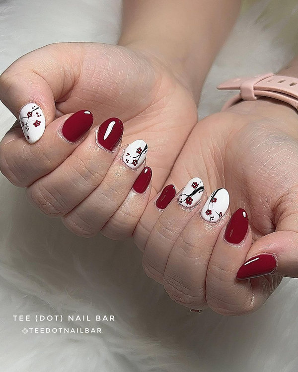 Nail design coordinated with bridal shoe embellishments